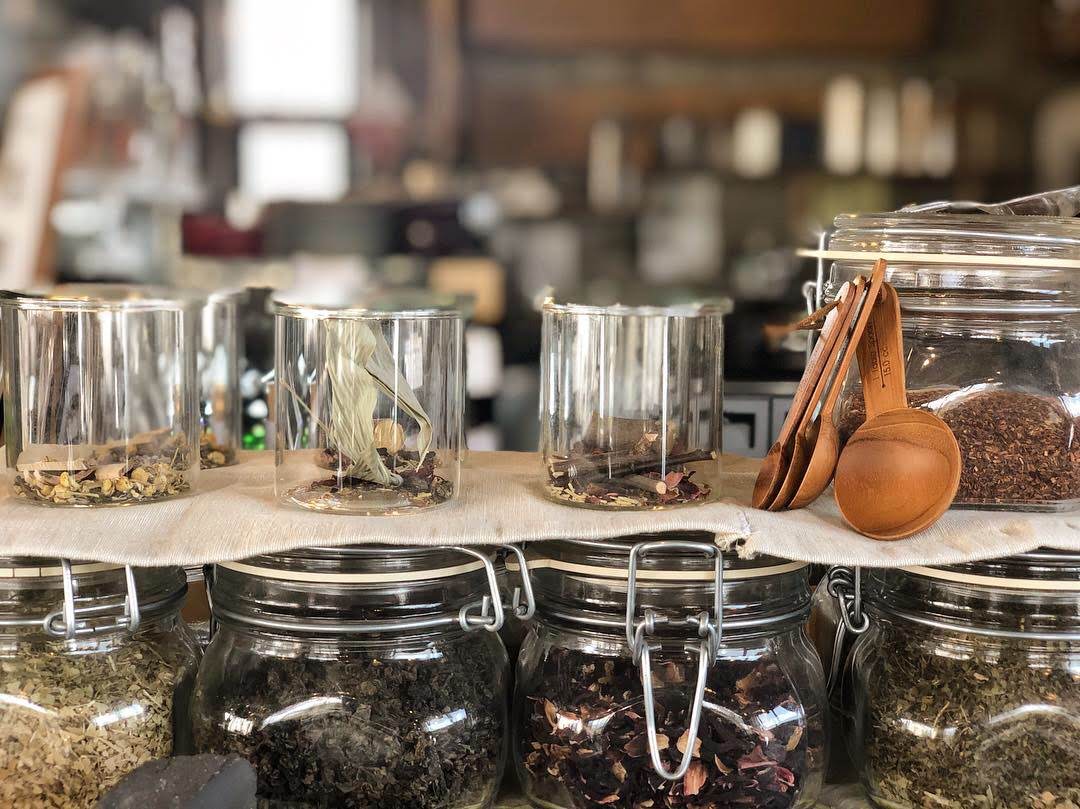 Glass jars of hand-blended loose leaf tea