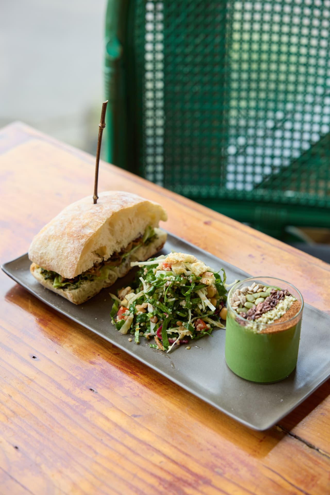 Plated vegan brunch with soup, toasted ciabatta, and fig salad