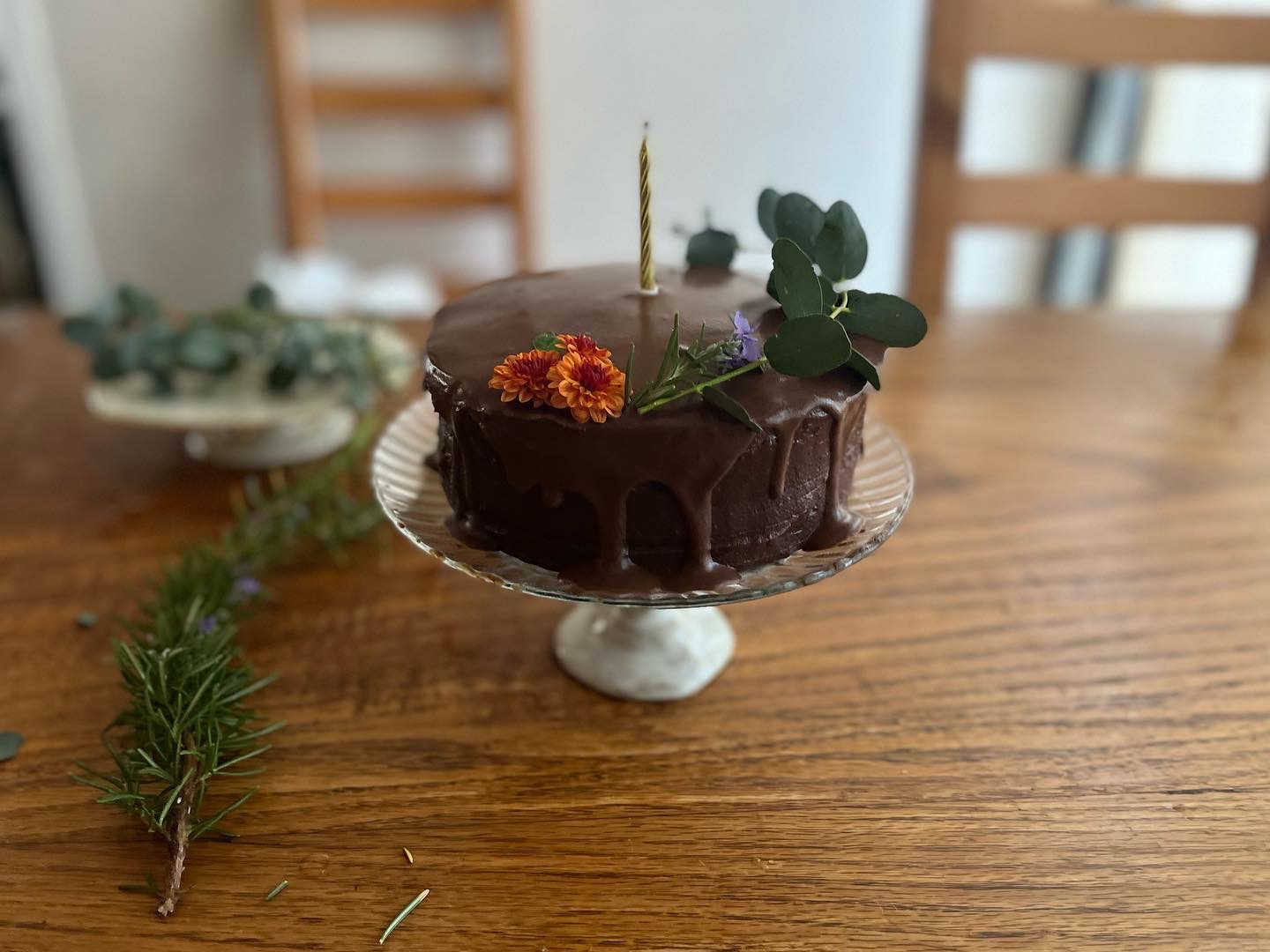 A vegan chocolate cake decorated with flowers